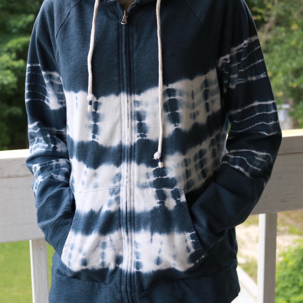 Blue sweater with white stripes